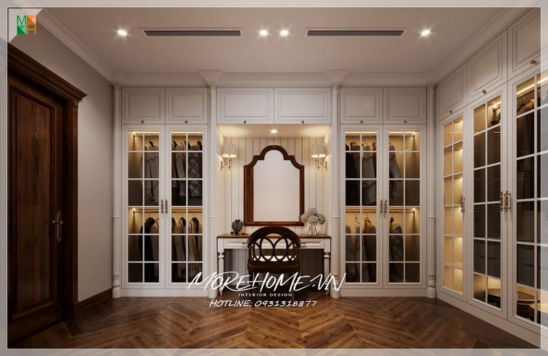 Phòng thay đồ master được thiết kế với hệ thống tủ quần áo kịch trần cánh kính bằng gỗ tự nhiên sơn trắng phong cách đương đại